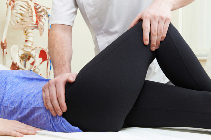 Female-patient-receiving-pre--and-post-operative-physical-therapy-for-hip-and-knee-joint-replacement