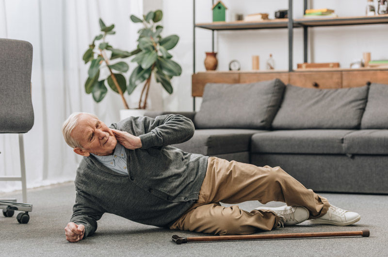 Elderly-man-lying-on-the-floor-after-a-fall